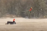 video coast guard helicopter man car oregon flood