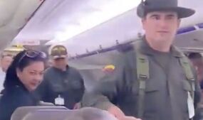 passenger arrested stealing flight attendants Colombia