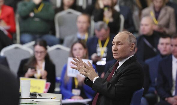 Vladimir Putin addresses reporters 